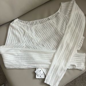 Long sleeve off shoulder asymmetrical hem crop top